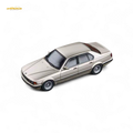 (Pre-Order) DCM BMW E32 7-Series Sedan Cashmere Beagle Gold 1:64